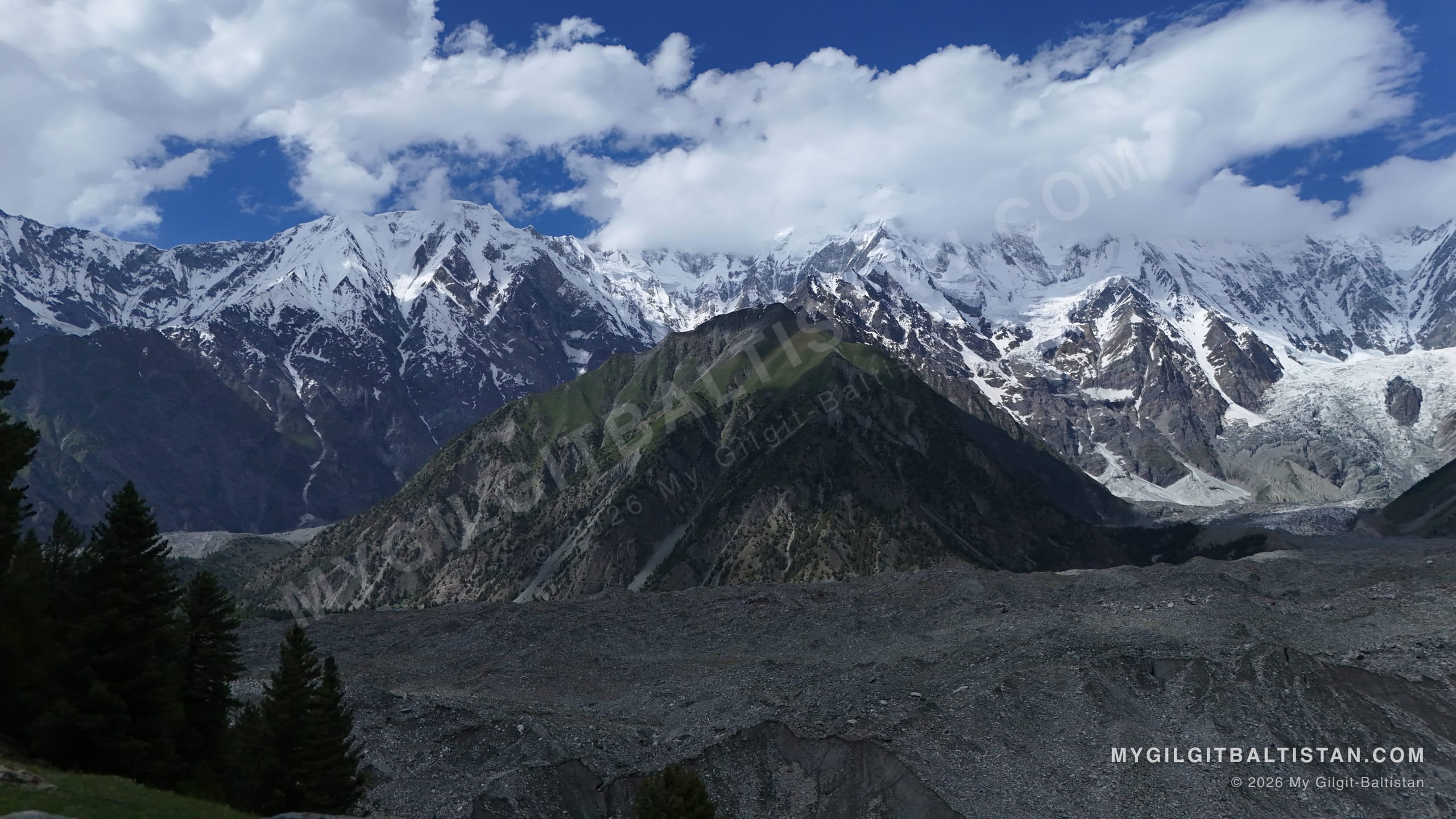 The full sweep of the glacier basin above Bagrote, its moraine running out into the valley floor.