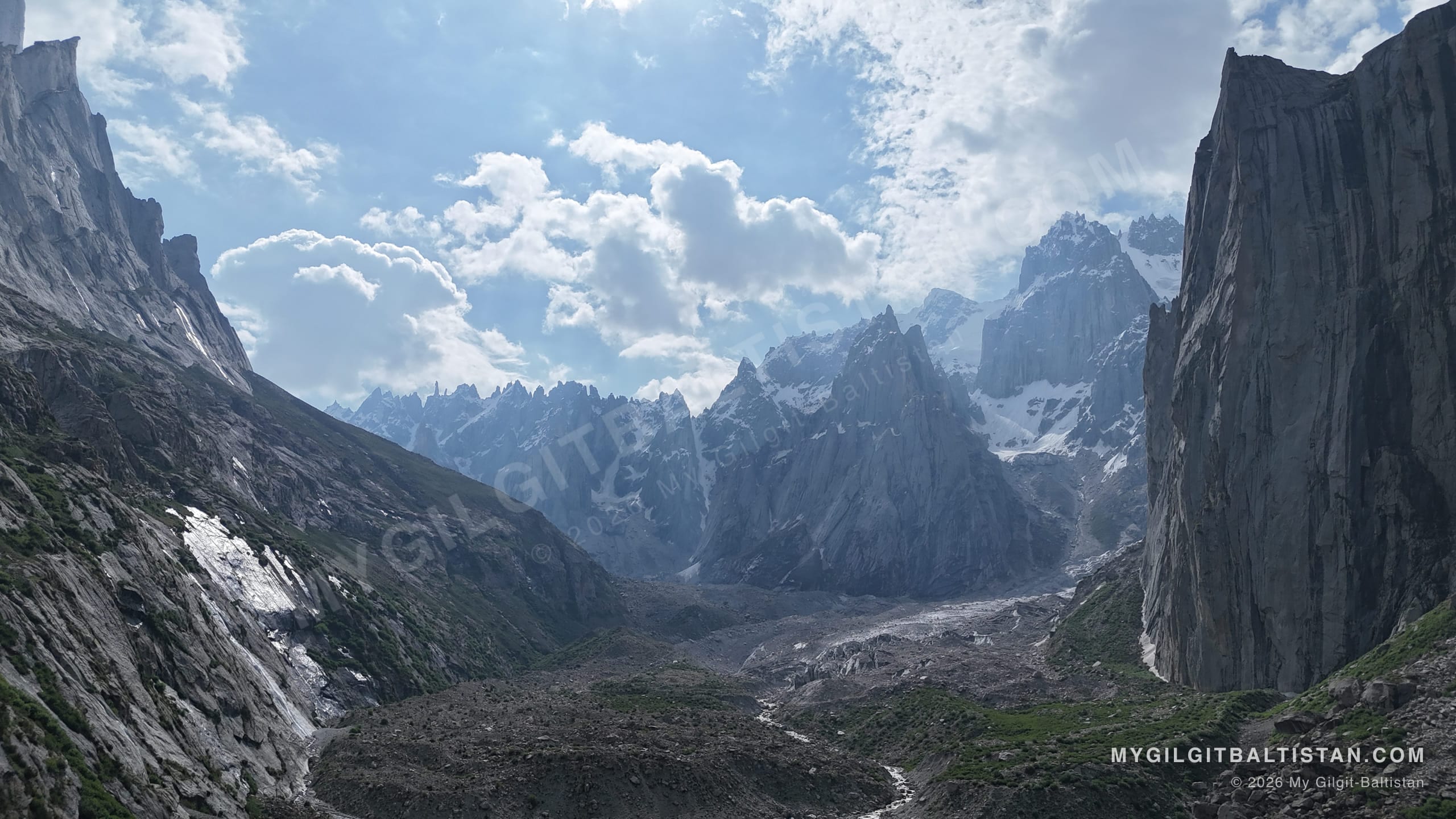 The boulder-strewn valley floor leading up between granite spires toward the high cirque.